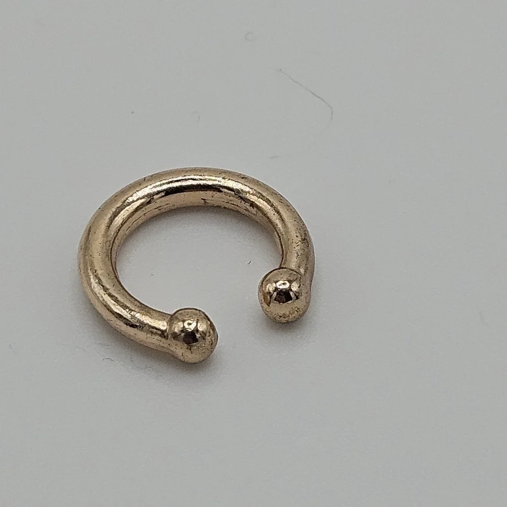 thick gold tone ear cuff